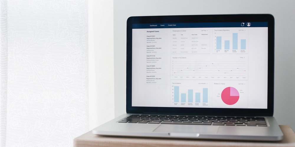 The Sunnyside reporting dashboard opened on a laptop computer